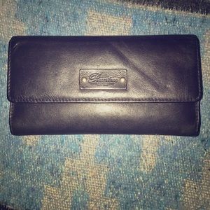 Dark brown wallet. LEATHER